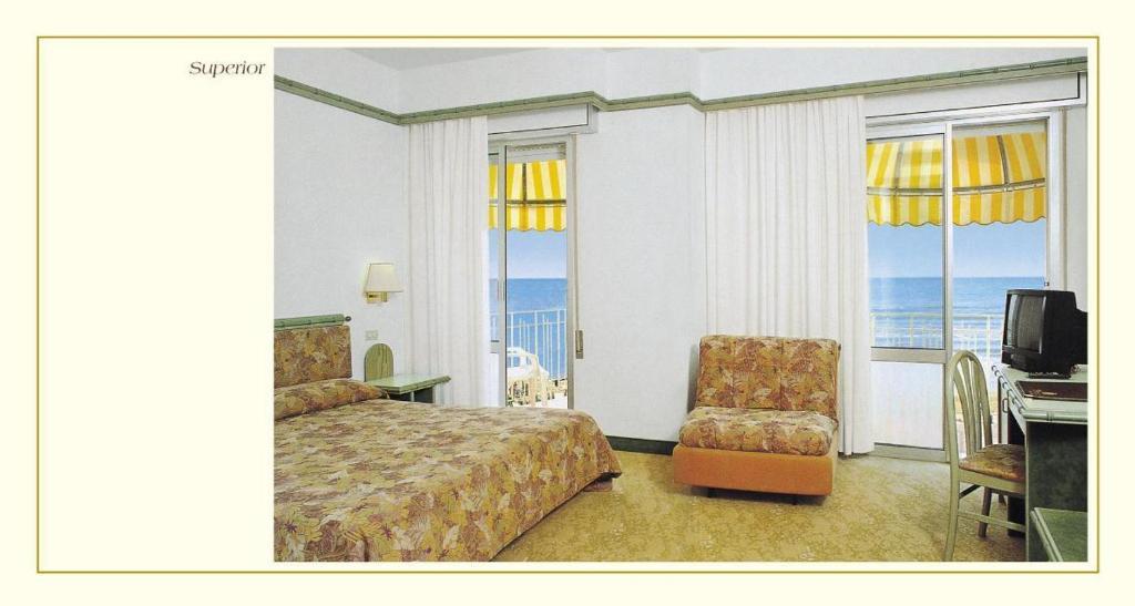Hotel Montecarlo Лидо-ди-Езоло Номер фото